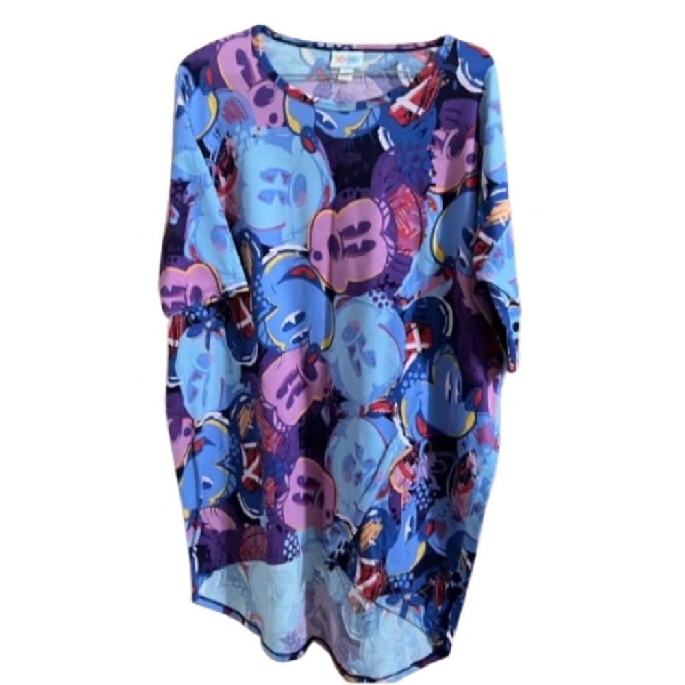 #146 This is a XS Disney Irma top a loose, knit “high-low” tunic, blue p…